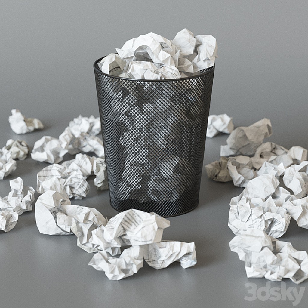 A trash can with papers