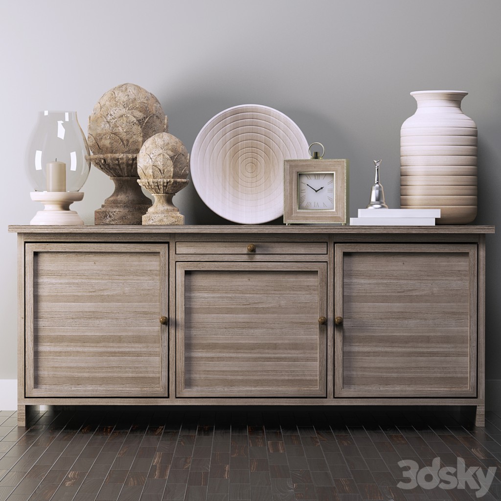 Chest of drawers with wooden decor, a vase and a candle with a candlestick