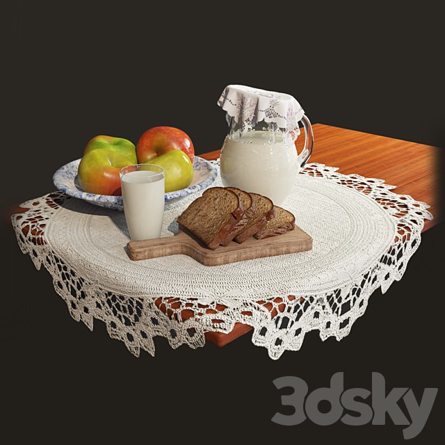 Rustic still life with a jug of milk, apples and bread